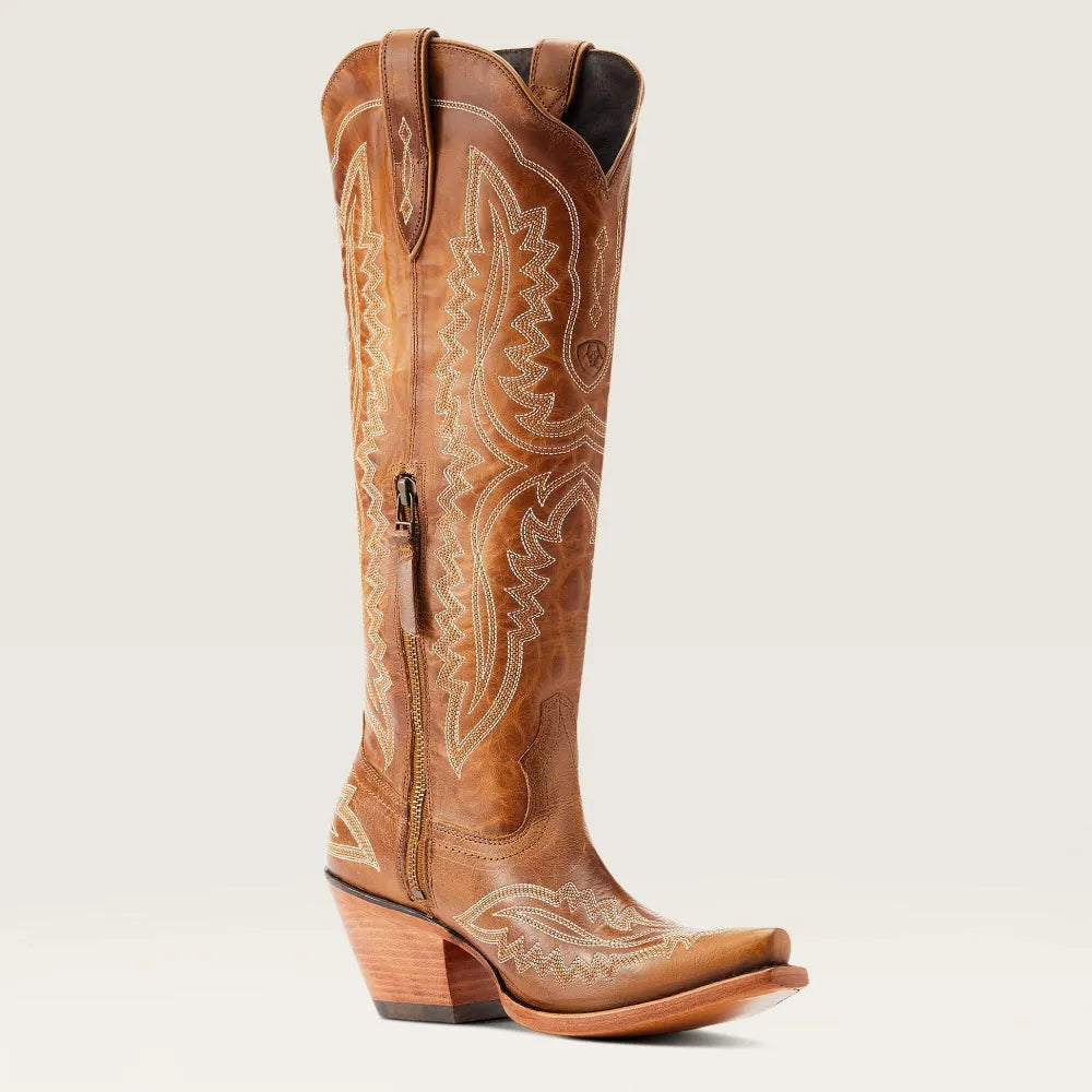 Bottes cowboy femme brodées. Bout pointu, talon cubain et tirette latérale.