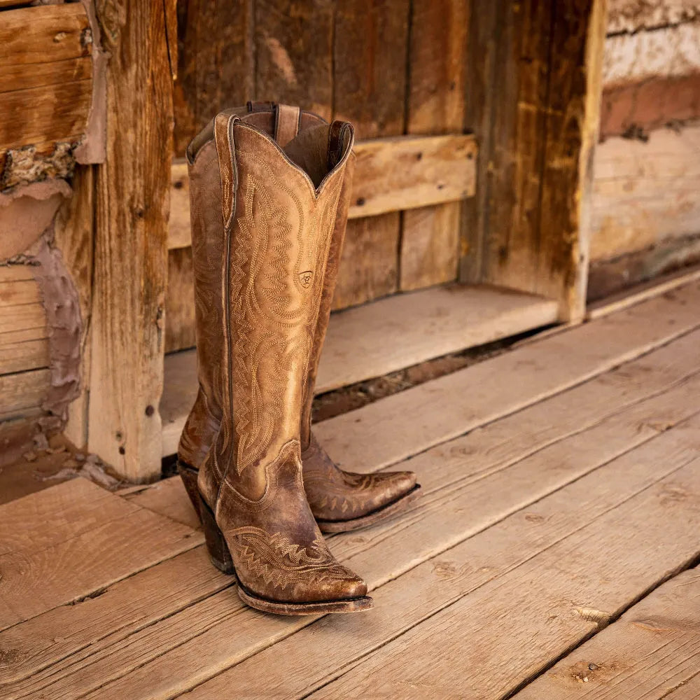 Bottes cowboy femme marron foncé brodées, bout pointu, talon cubain, tirette latérale.