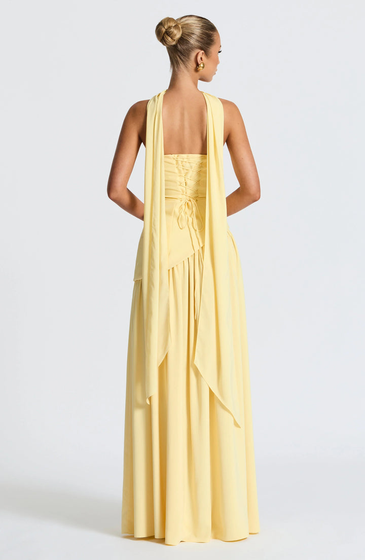 Robe longue femme en coton avec col ras-du-cou et fente sur le côté, idéale pour un look décontracté et élégant.