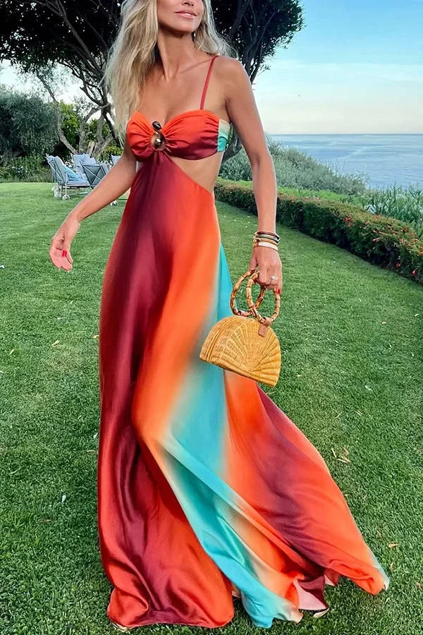 Robe longue en tissu léger dégradé rouge turquoise, avec découpe moderne et bretelles fines, idéale pour les soirées d'été.